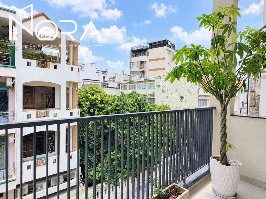 Open District 1 service apartment right on Tân Định.