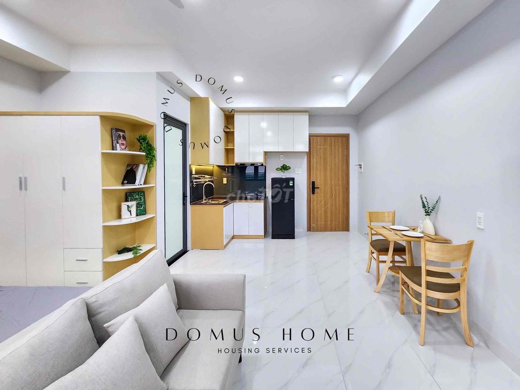 The studio is full of furniture, balconys, open windows in the center of District 7
