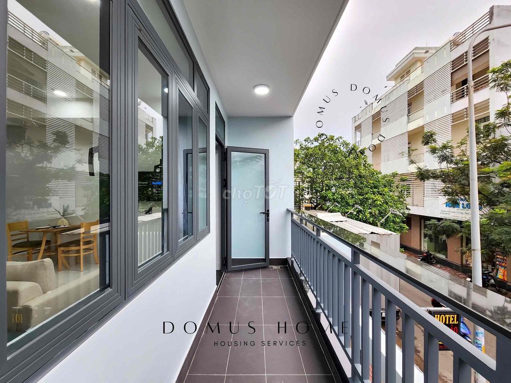 The studio is full of furniture, balconys, open windows in the center of District 7