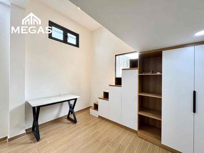 The service apartment has basic walls and interiors, big empty rooms.