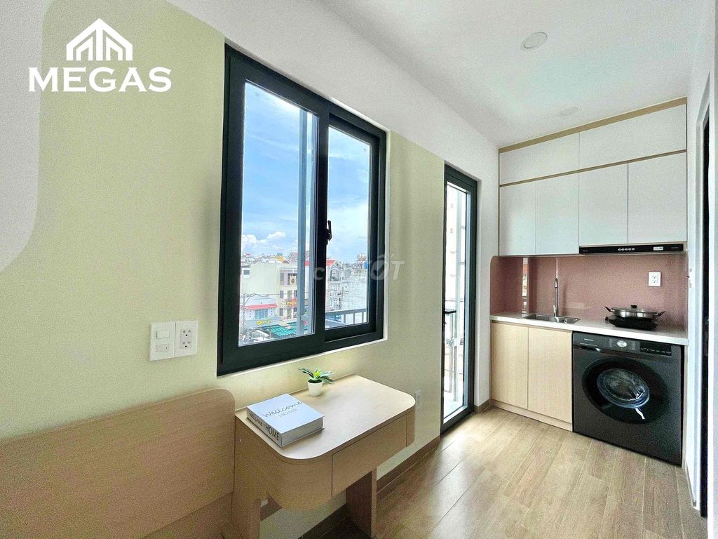 The balcony studio -- the private washing machine -- the smell cleaner -- from the kitchen.