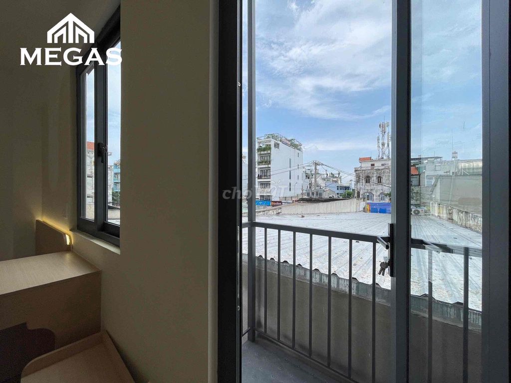 The balcony studio -- the private washing machine -- the smell cleaner -- from the kitchen.