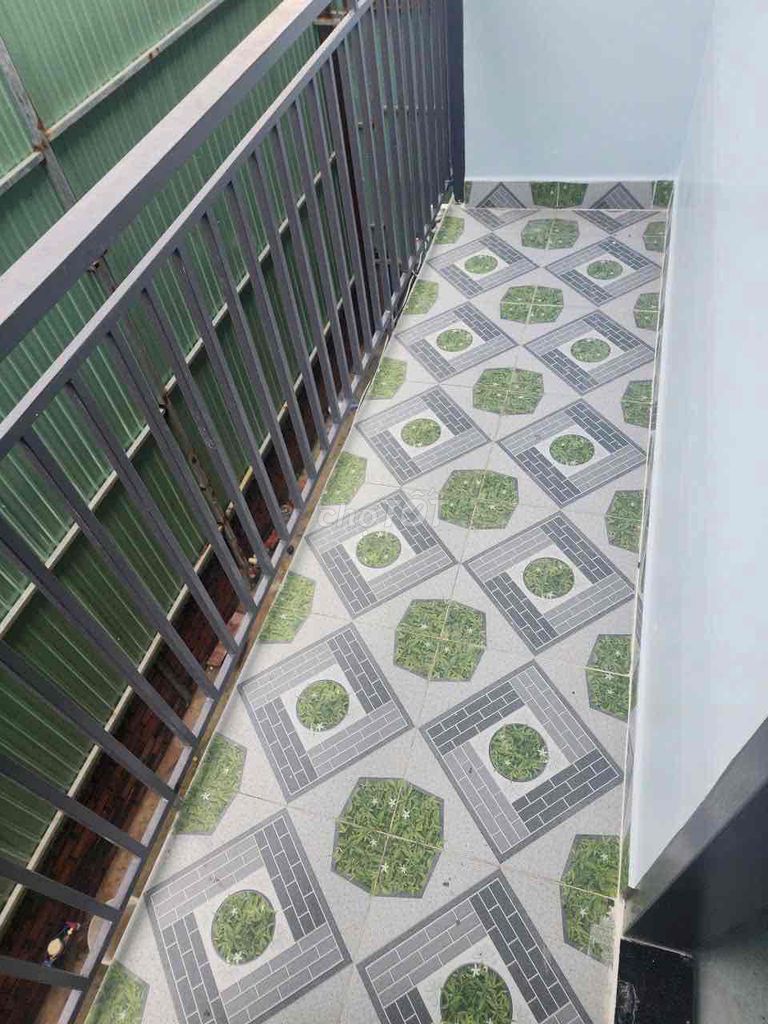 The original building near Lê Văn Lương University has a complete interior.