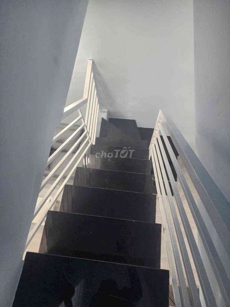 The original building near Lê Văn Lương University has a complete interior.
