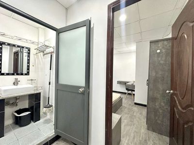 A full interior bedroom with a free kitchen.