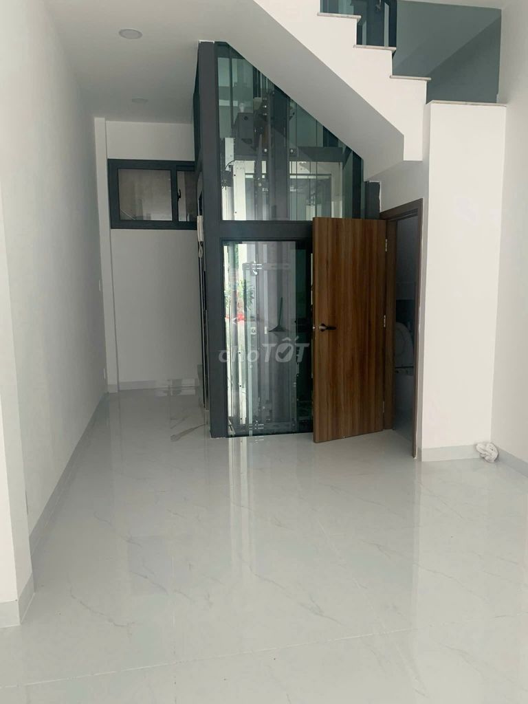 Front house to District 1, Xô Viết Nghệ Tĩnh, 4 X20, 4 stories, elevator