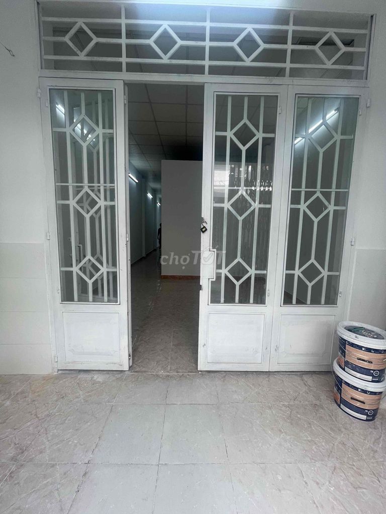 A nice new paint house, two bedrooms. A bathroom near the toilet.