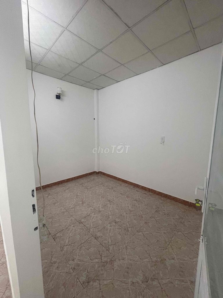 A nice new paint house, two bedrooms. A bathroom near the toilet.