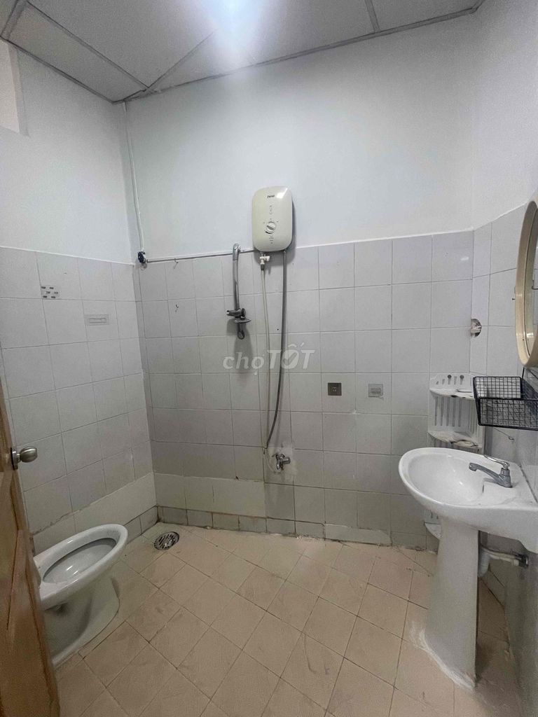 A nice new paint house, two bedrooms. A bathroom near the toilet.