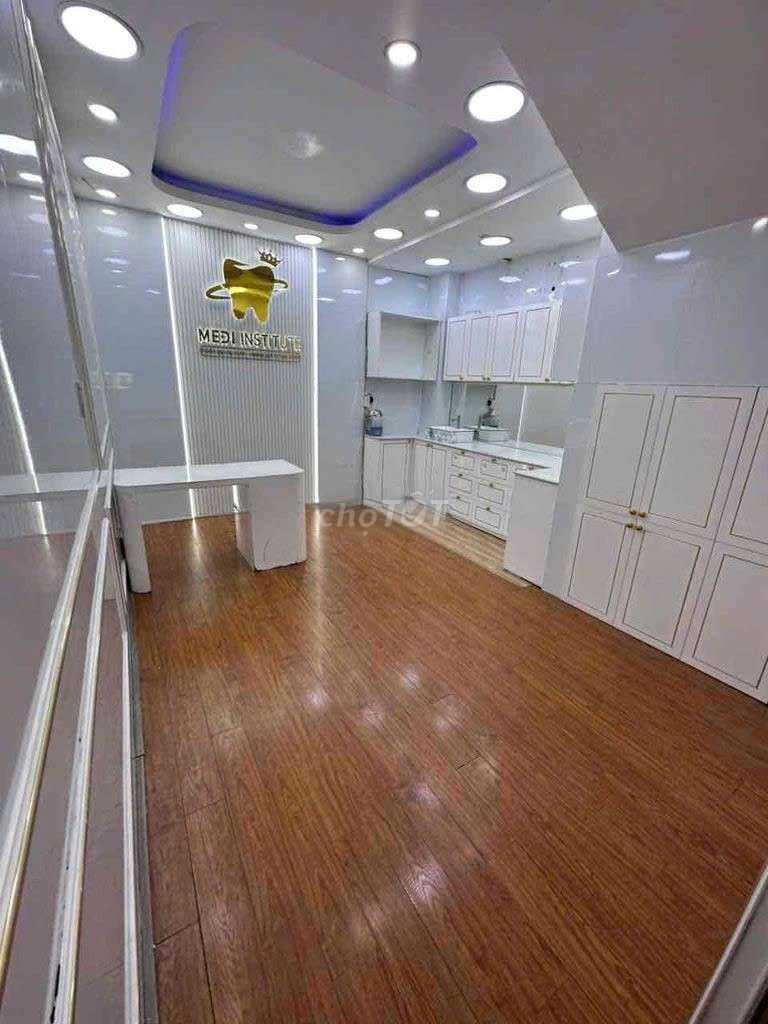 Nice four-story house -- business front.