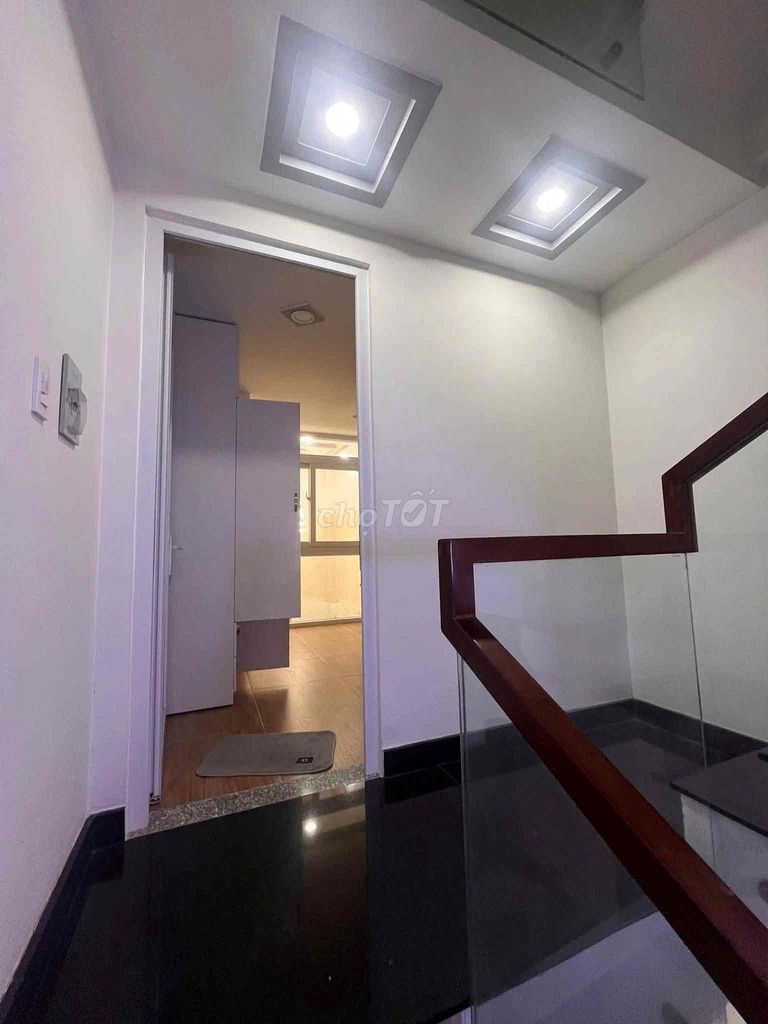 In the alley. Two bedrooms with basic interiors.