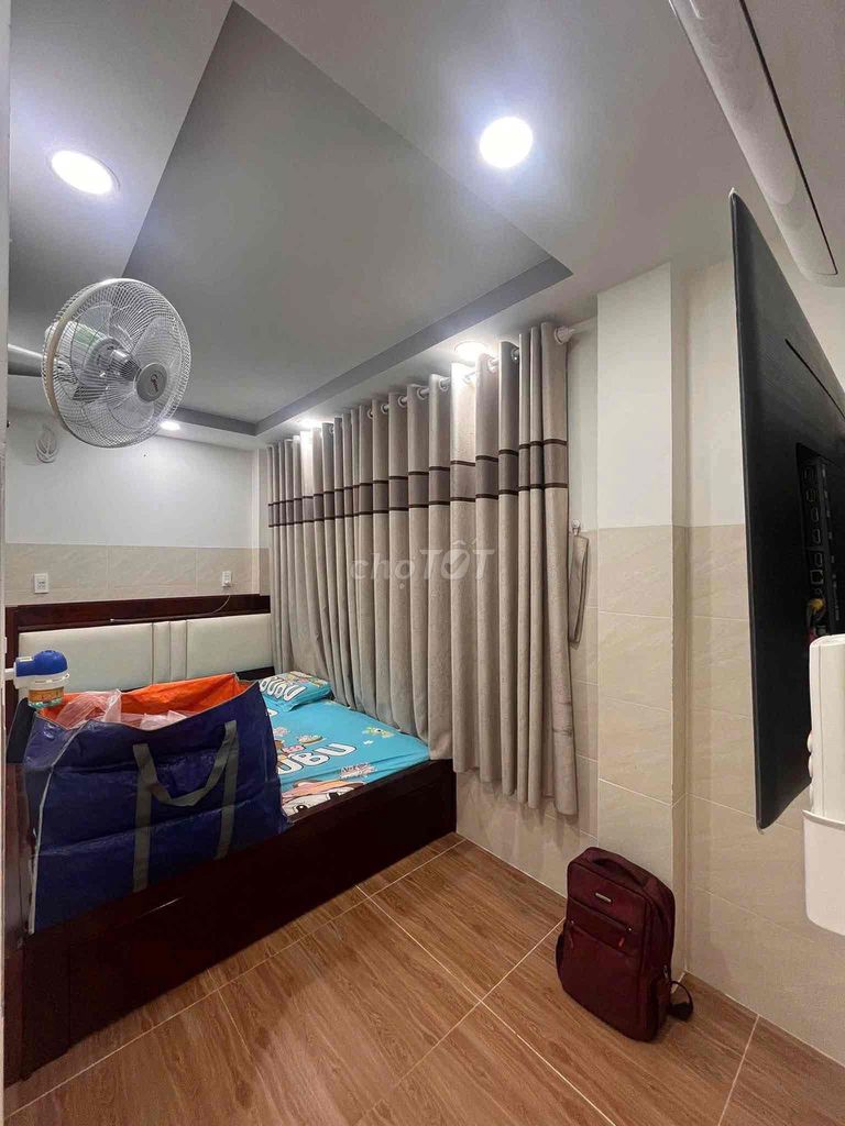 In the alley. Two bedrooms with basic interiors.