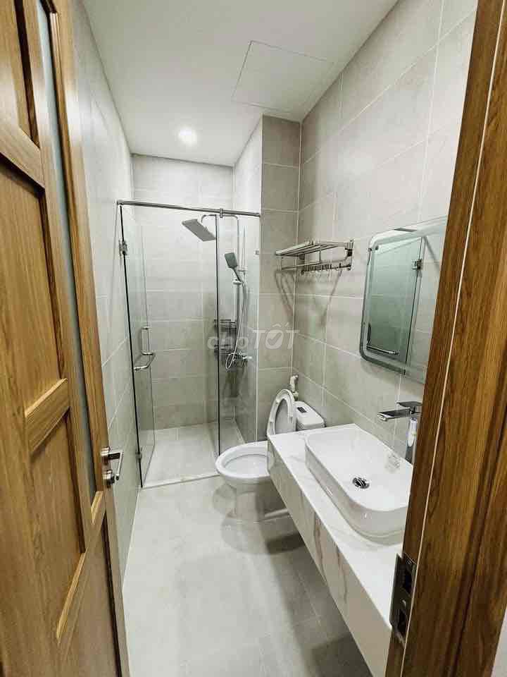 a rare-new four bedrooms, five toilets across from the city ql13 Hiệp Bình Phước.