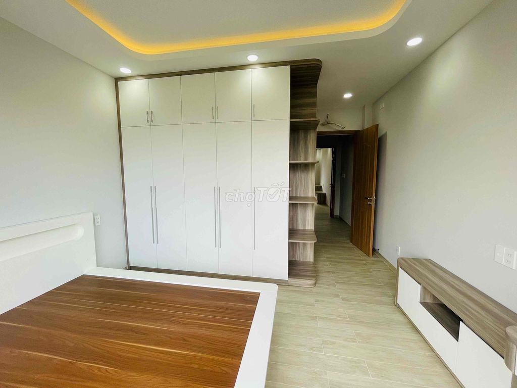 a rare-new four bedrooms, five toilets across from the city ql13 Hiệp Bình Phước.