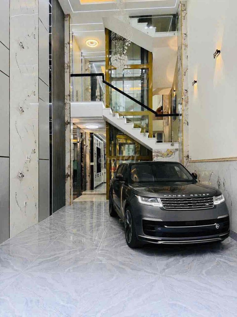 The beautiful new home has an elevator for the N-E-E-E-P. New District One.