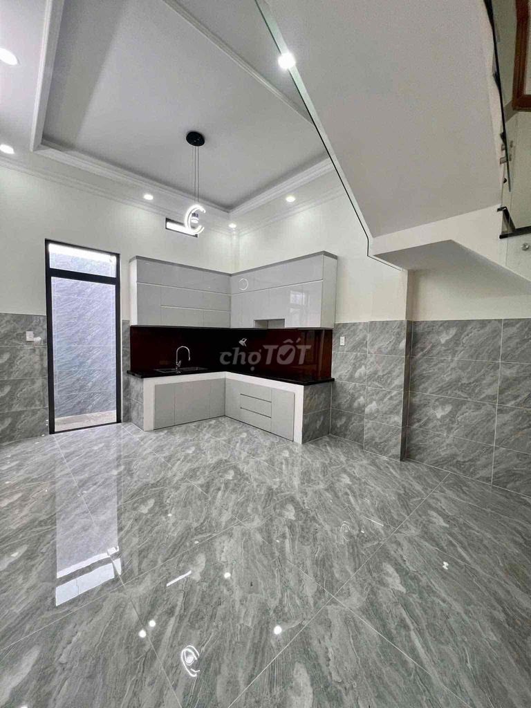 New place. Two floors, four bedrooms. Three bathrooms.