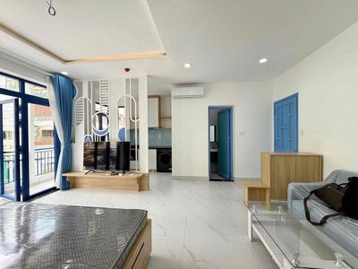 A Trần Hưng Đạo balcony bedroom in 1st, downtown, high-end interior.