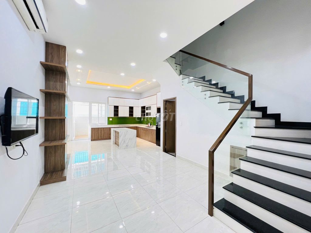 Three-story bubble-splitting compass -- full modern interior -- four bedrooms three toilets.