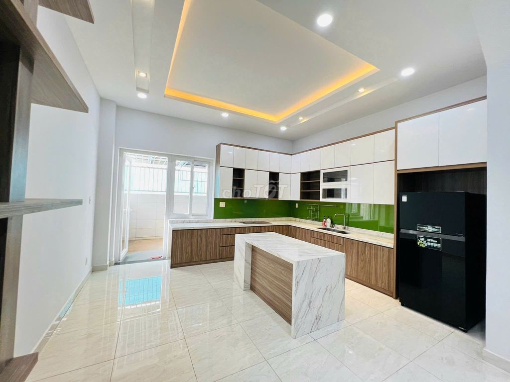 Three-story bubble-splitting compass -- full modern interior -- four bedrooms three toilets.