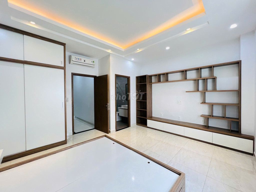 Three-story bubble-splitting compass -- full modern interior -- four bedrooms three toilets.