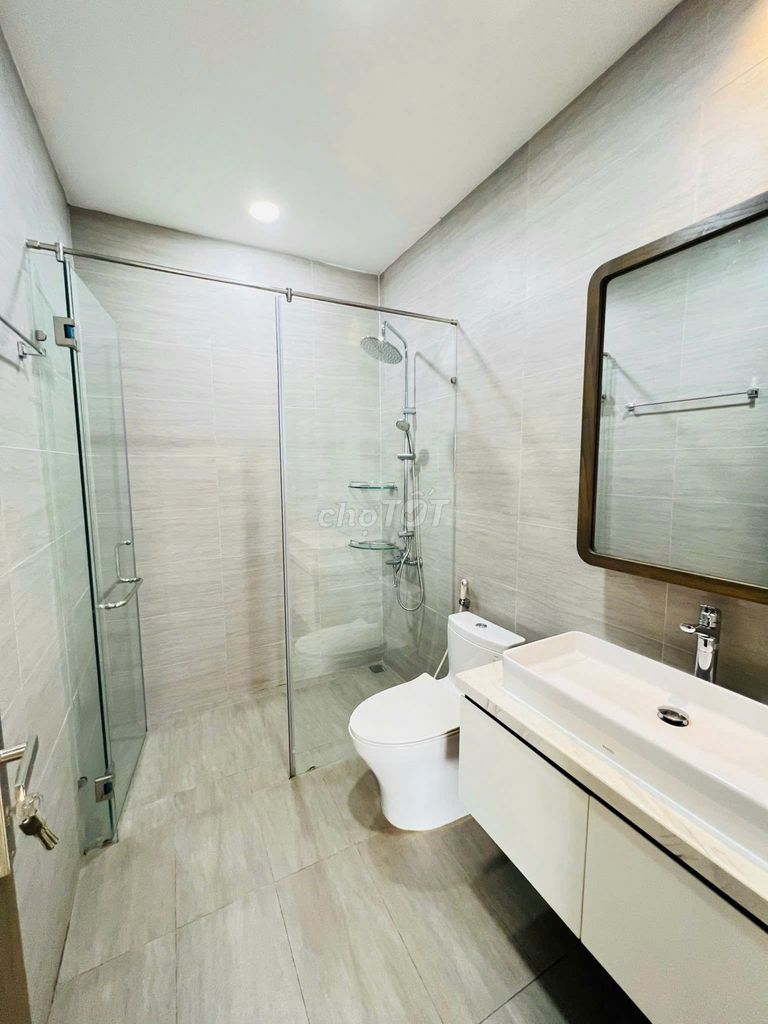 Three-story bubble-splitting compass -- full modern interior -- four bedrooms three toilets.