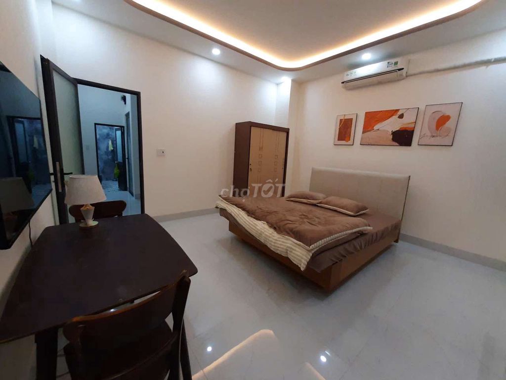 Rent a new home building full of furniture near Hưng Long Market