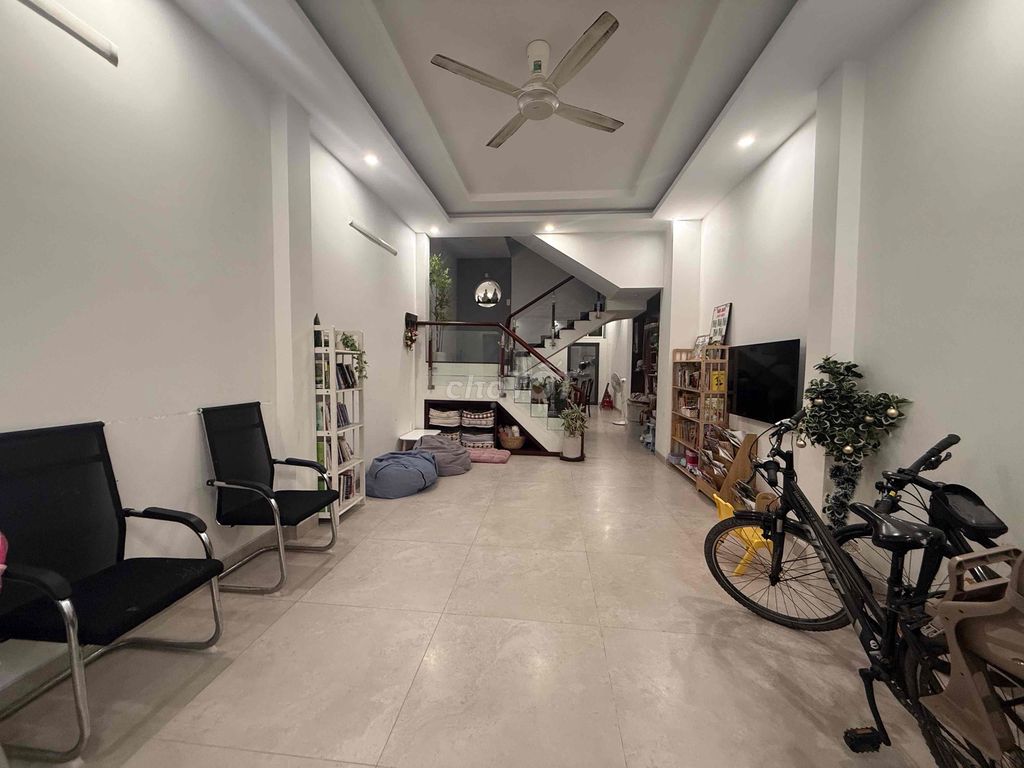 New house full of furniture front of District 7