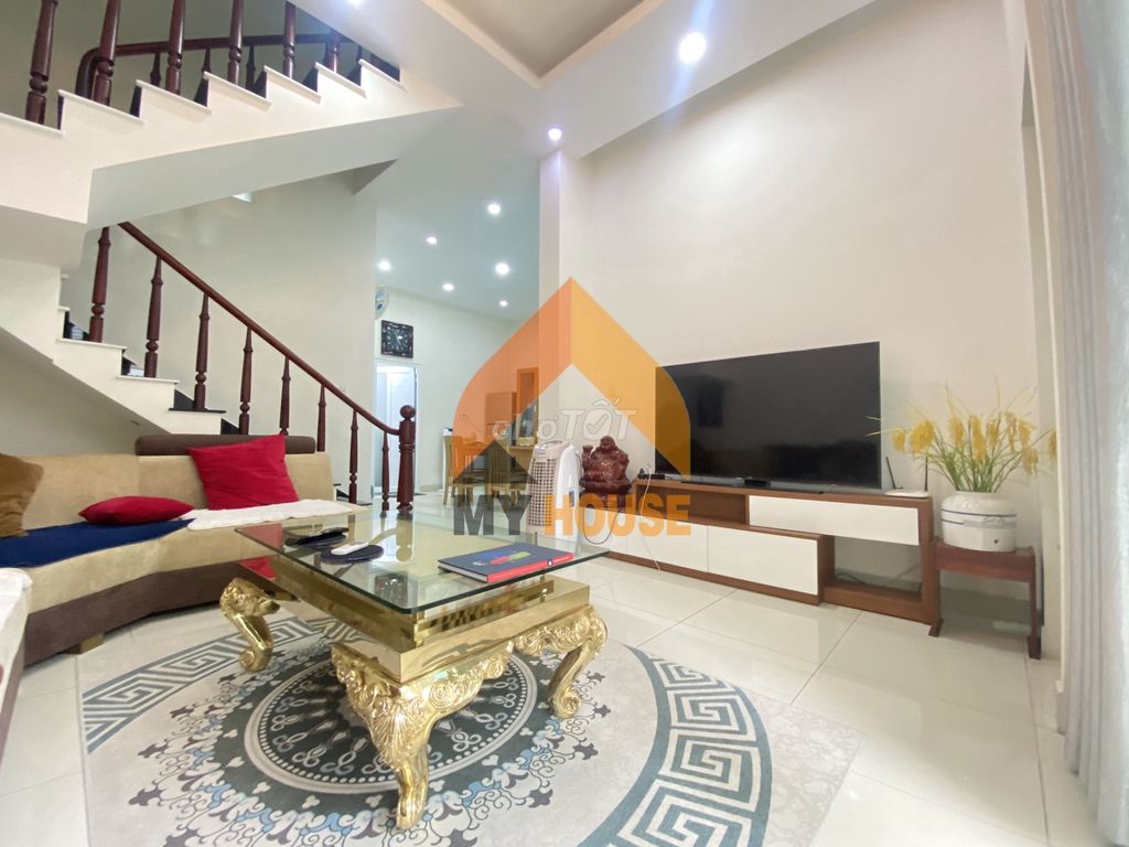 The nice little villa with the suitcase in it.