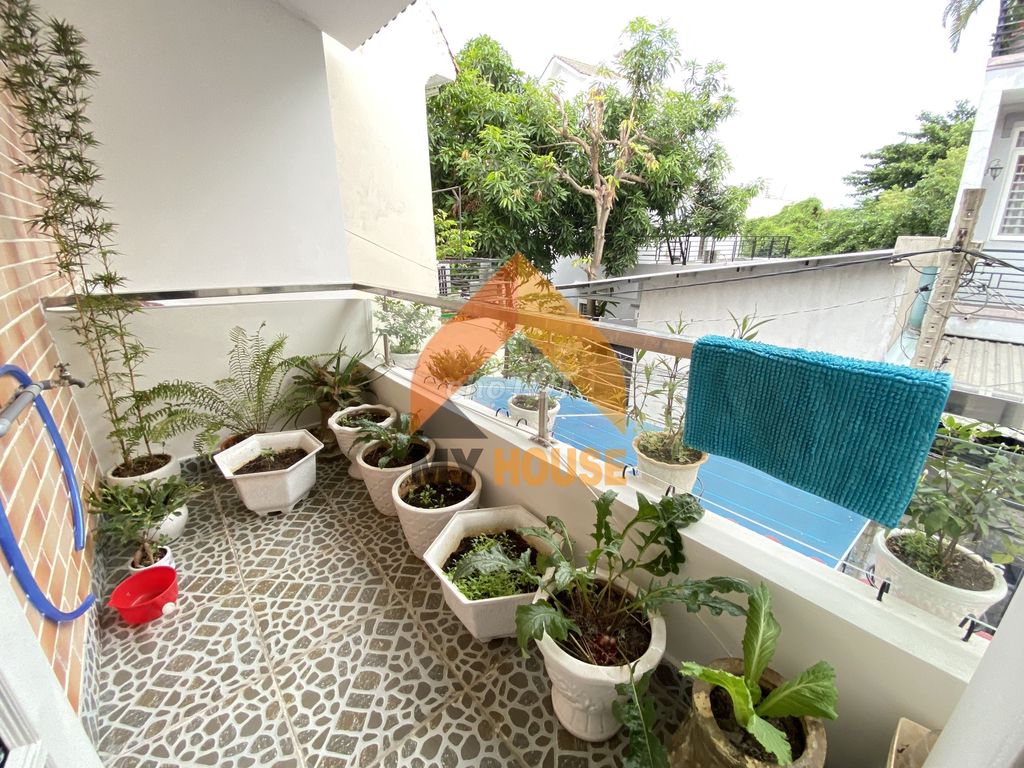 The nice little villa with the suitcase in it.