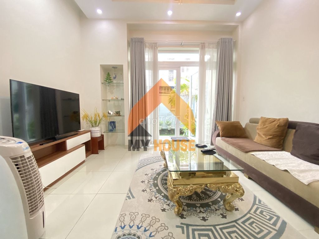 The nice little villa with the suitcase in it.
