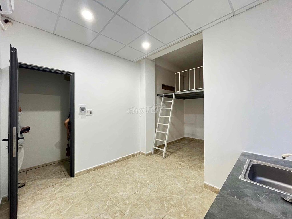 Room with a full-size window interior. The elevator shaft gets a tram.