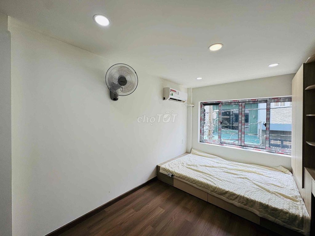 The new apartment was built at the school hall.