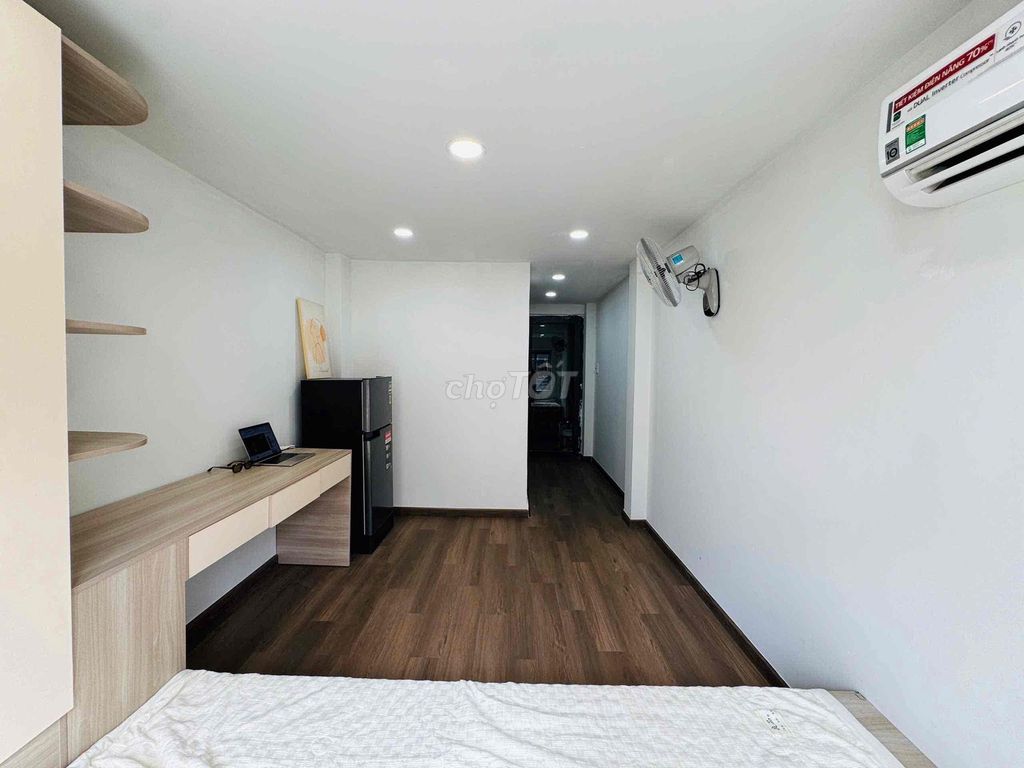 The new apartment was built at the school hall.