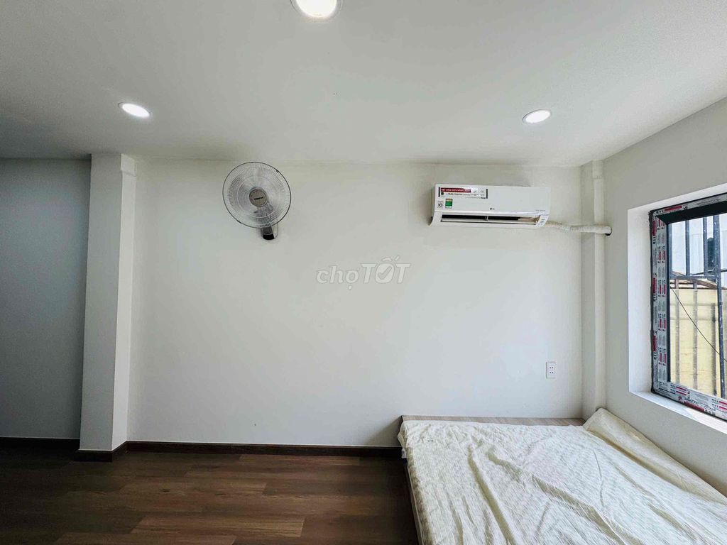 The new apartment was built at the school hall.