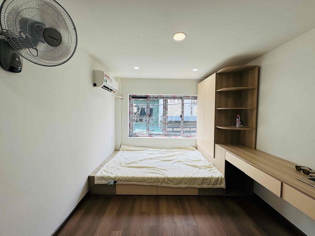 The new apartment was built at the school hall.