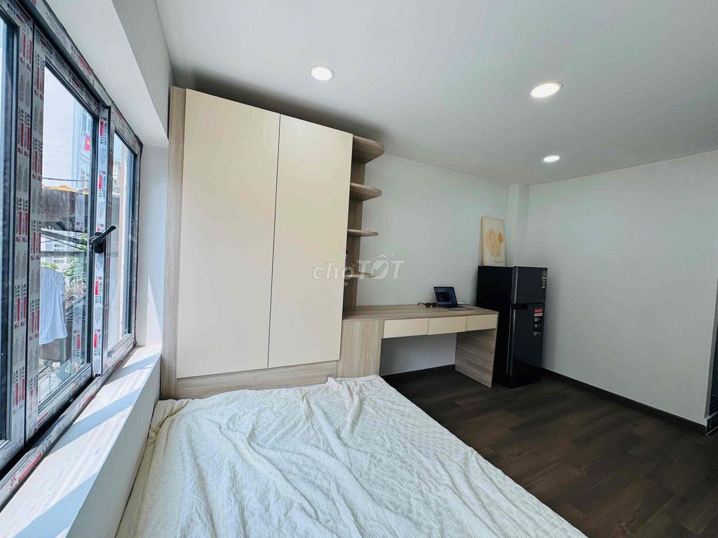 The new apartment was built at the school hall.