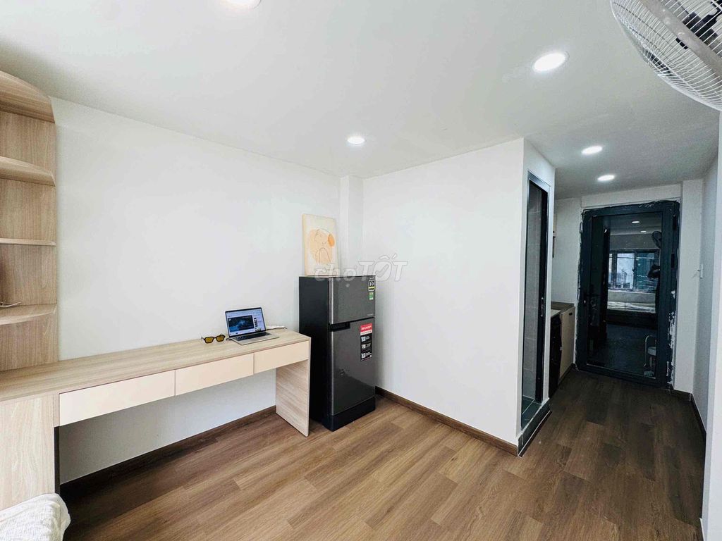 The new apartment was built at the school hall.