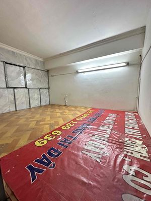 The cheap room at the east bus stop.