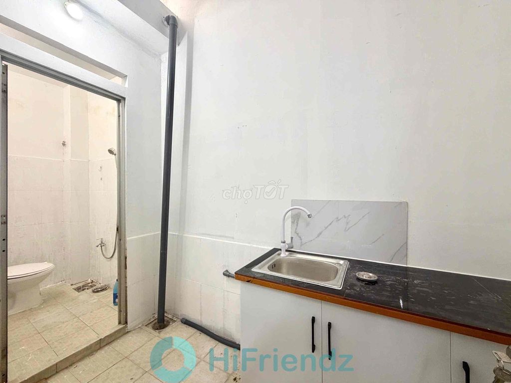 The apartment. A kitchen room near the new Aeon Business College.