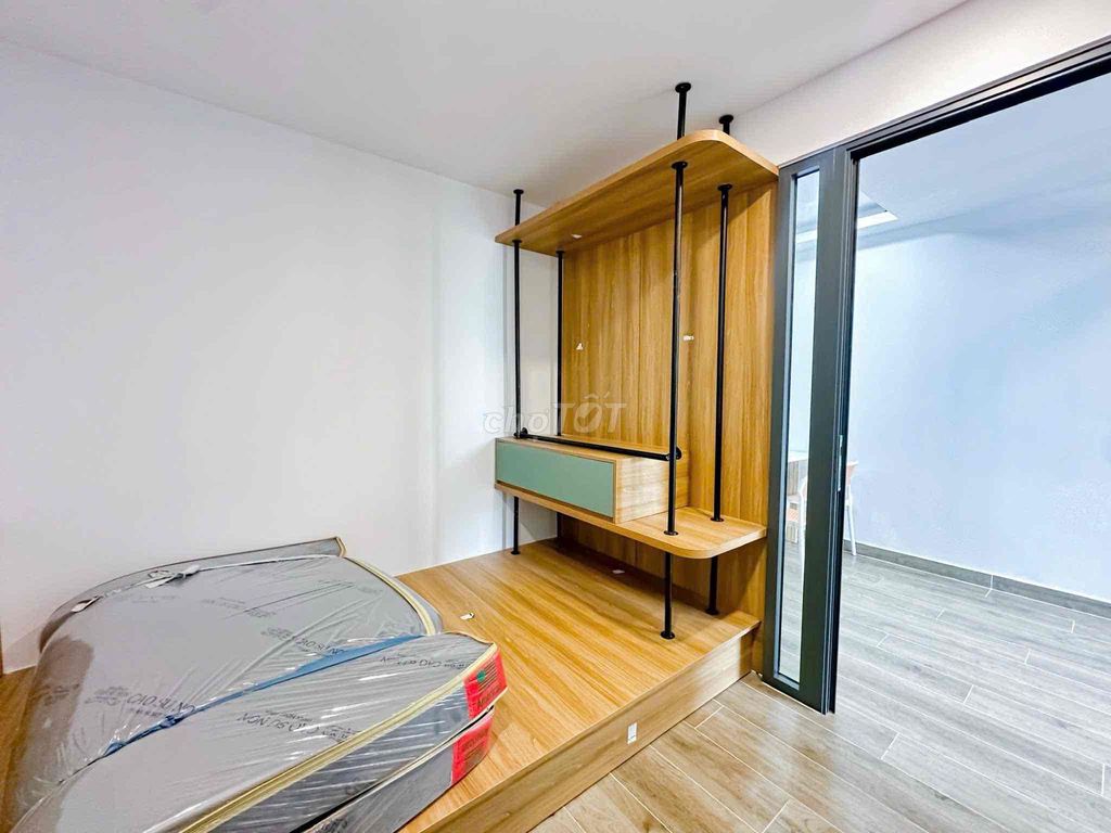 A new bedroom 100 percent balcony Nguyễn Đình Chiểu private washing machine, District 3.