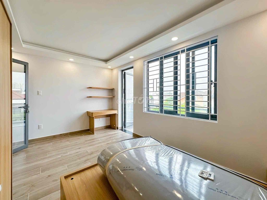 A new bedroom 100 percent balcony Nguyễn Đình Chiểu private washing machine, District 3.