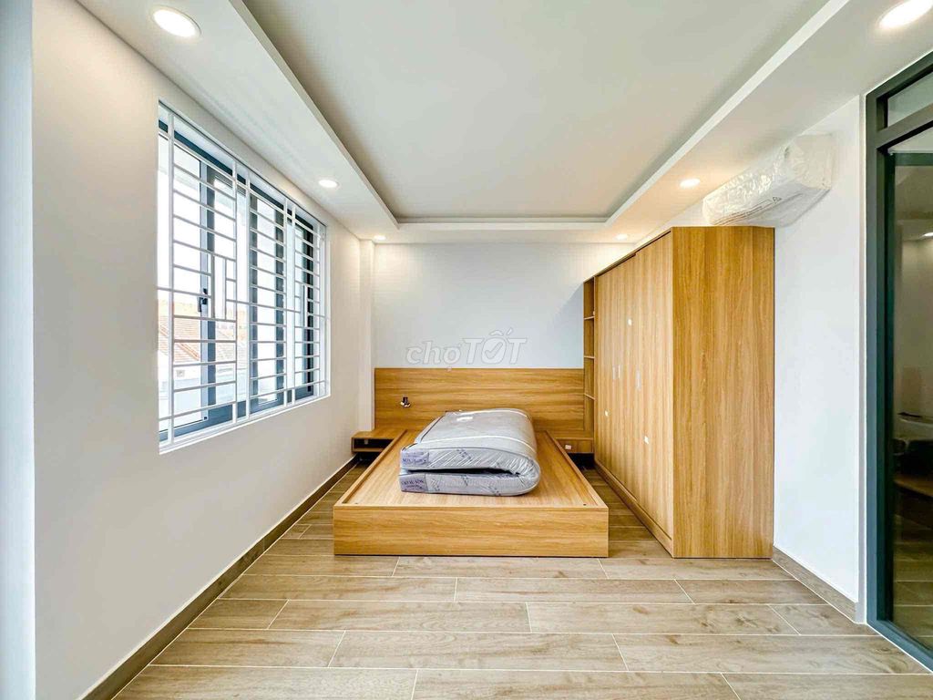 A new bedroom 100 percent balcony Nguyễn Đình Chiểu private washing machine, District 3.