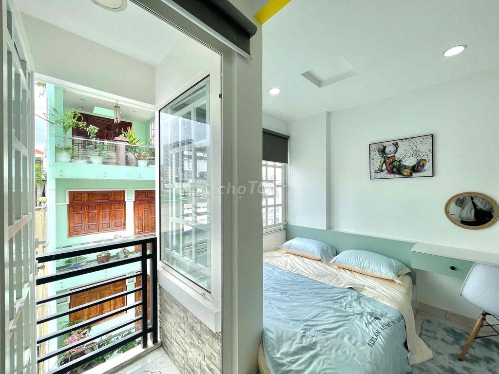 Opening the beautiful balcony at Tân Định District 1.