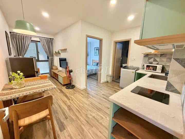One bedroom, one living room, one large window.