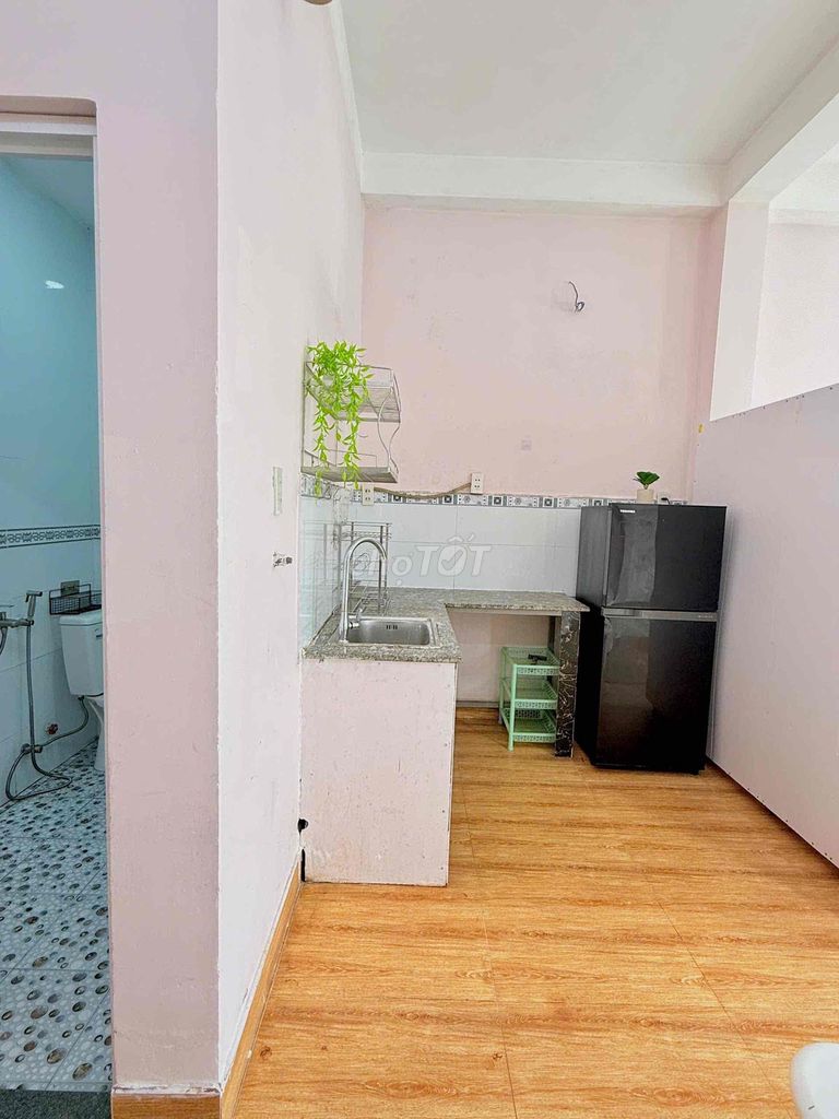 The balcony studio is full of furniture - private washing machine