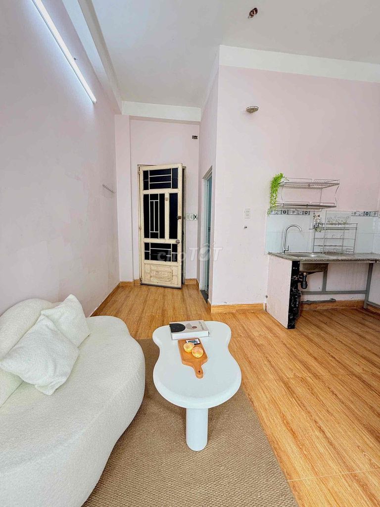 The balcony studio is full of furniture - private washing machine