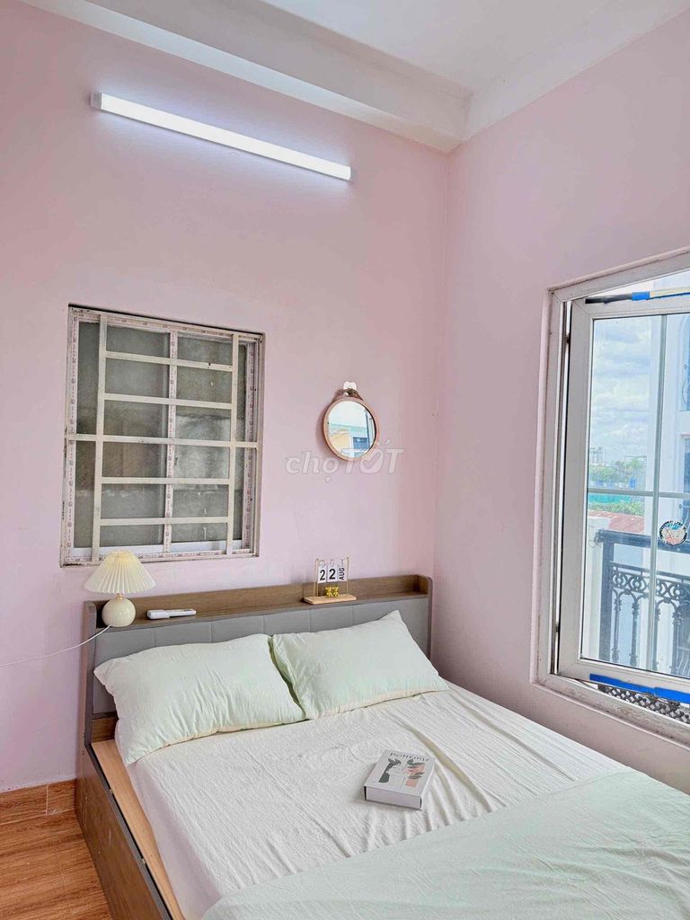 The balcony studio is full of furniture - private washing machine