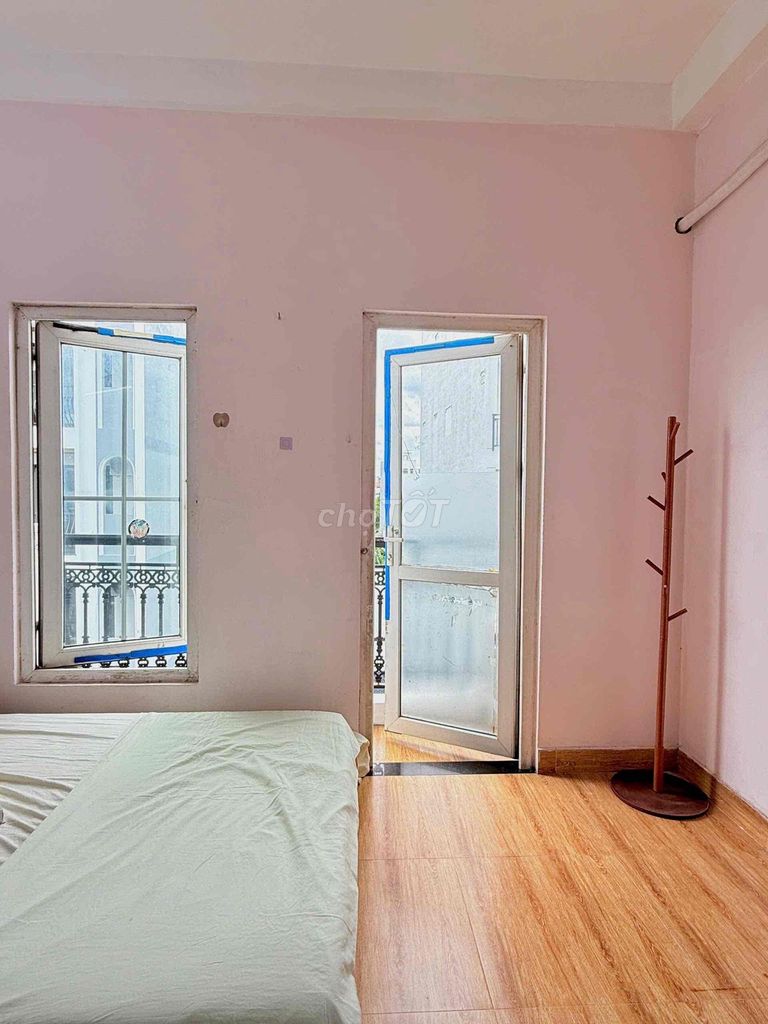 The balcony studio is full of furniture - private washing machine