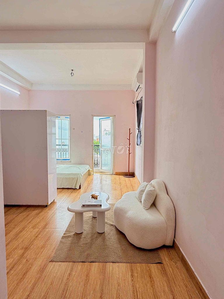 The balcony studio is full of furniture - private washing machine