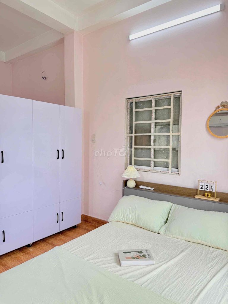 The balcony studio is full of furniture - private washing machine